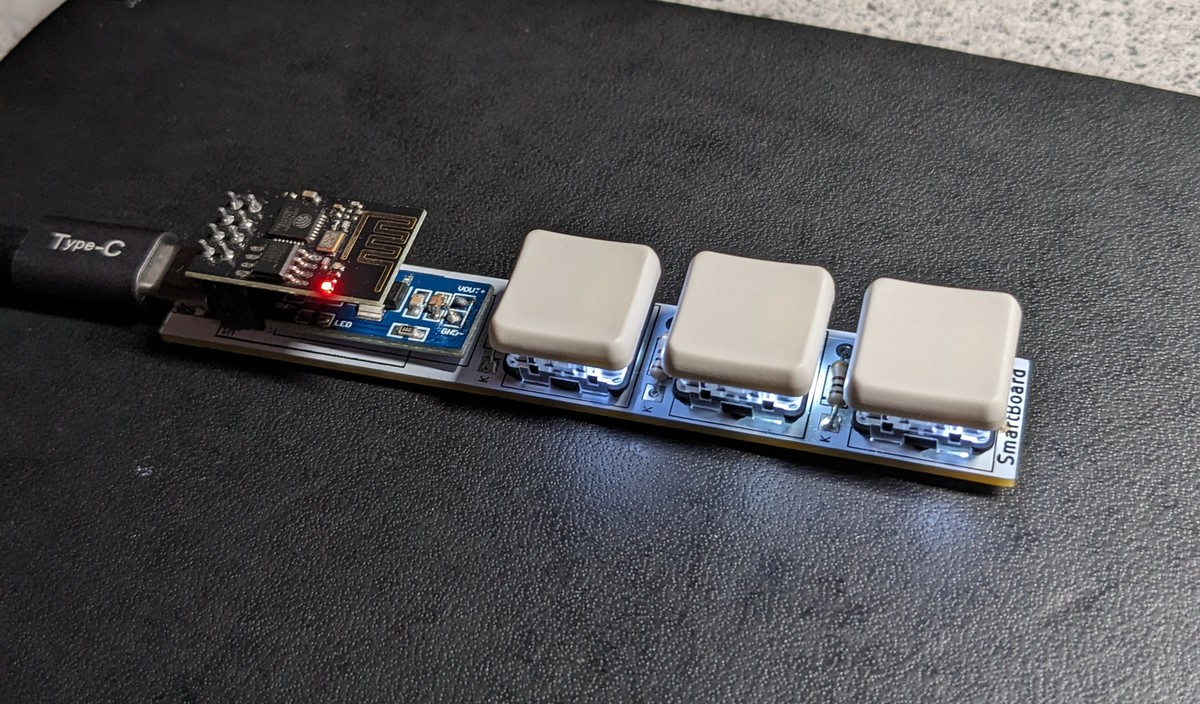 The assembled IoT Keyboard with the USB-C port, ESP-01 module and three keycaps fitted