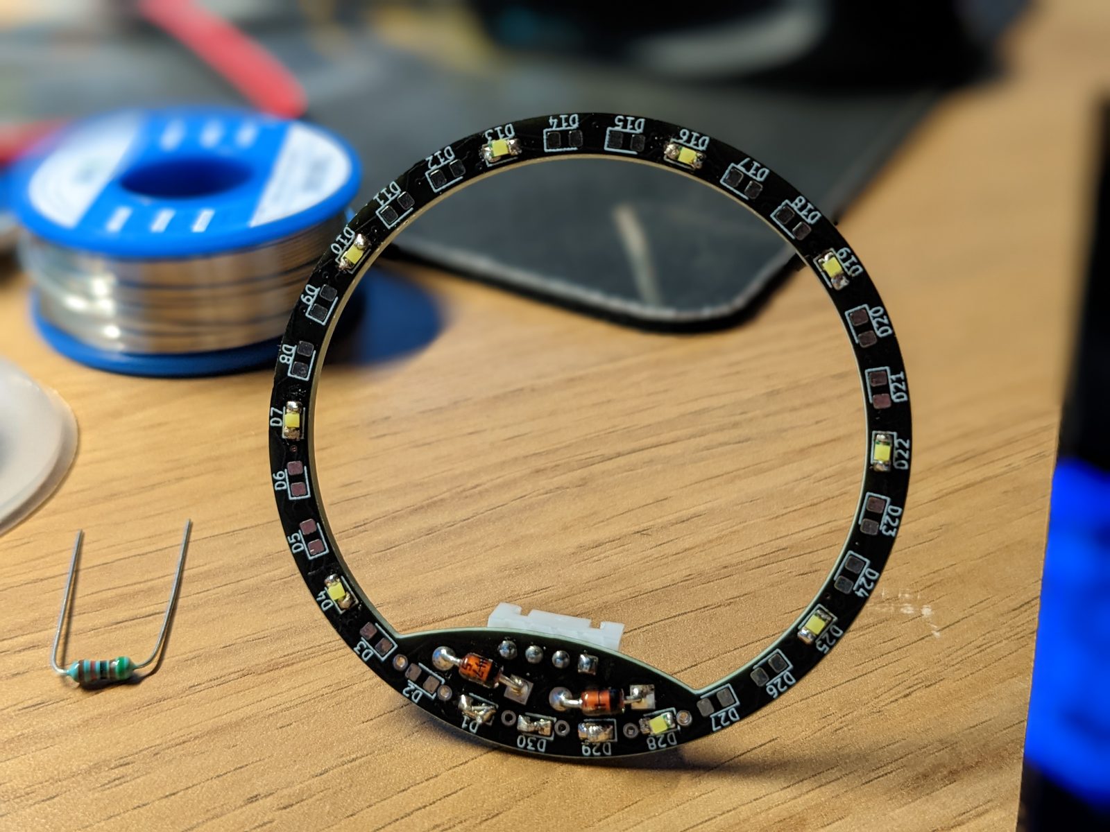 The bare ring with LEDs and zener diodes soldered along part of the board