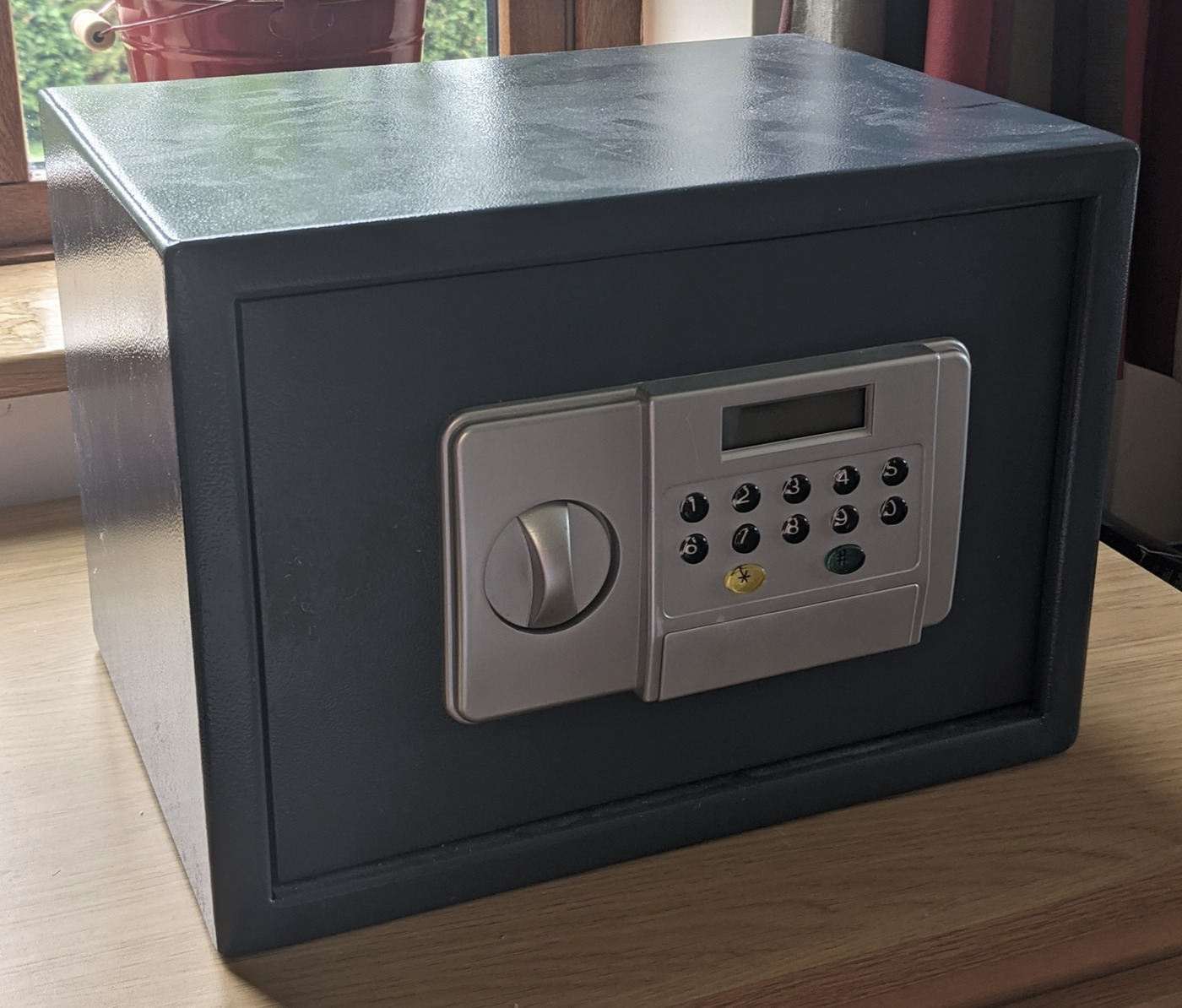 The safe, closed, with its original keypad still fitted to the front